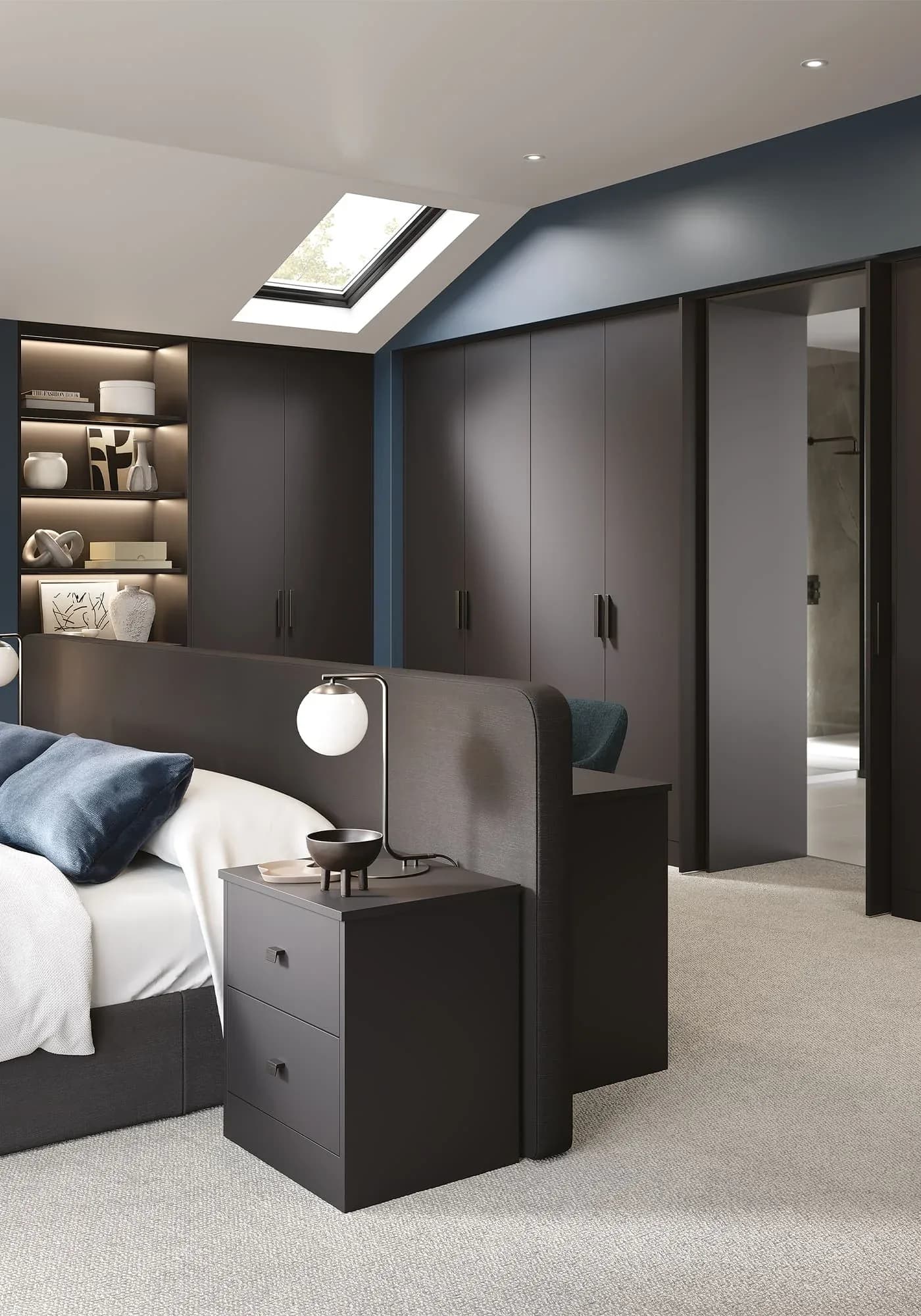 Graphite fitted bedroom with bedside tables, bed and sloped ceiling