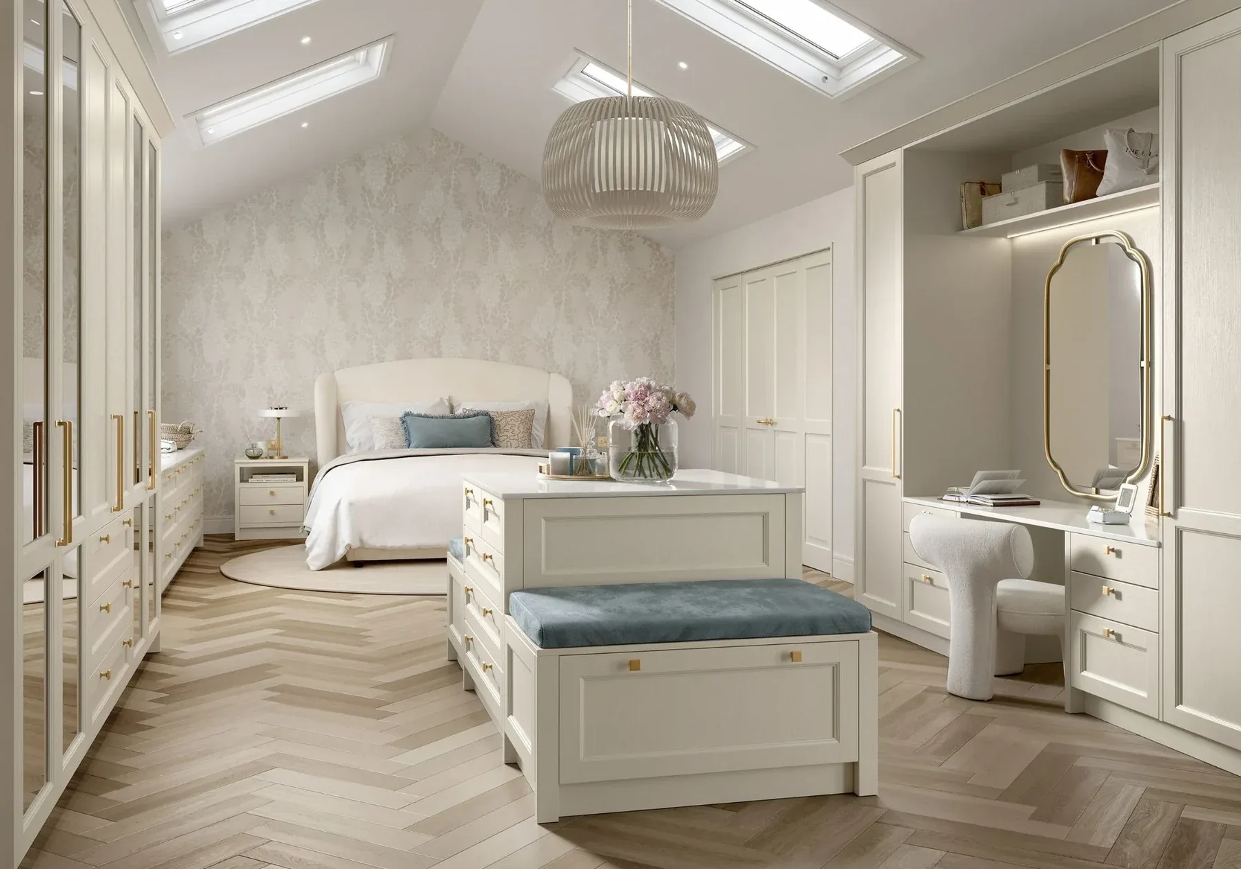Walk-in dressing room in taupe with fitted wardrobes and central bench