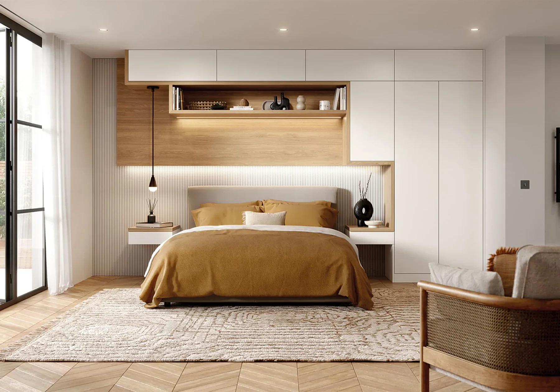 White fitted bedroom with over-bed cupboards, side wardrobes and bedside storage