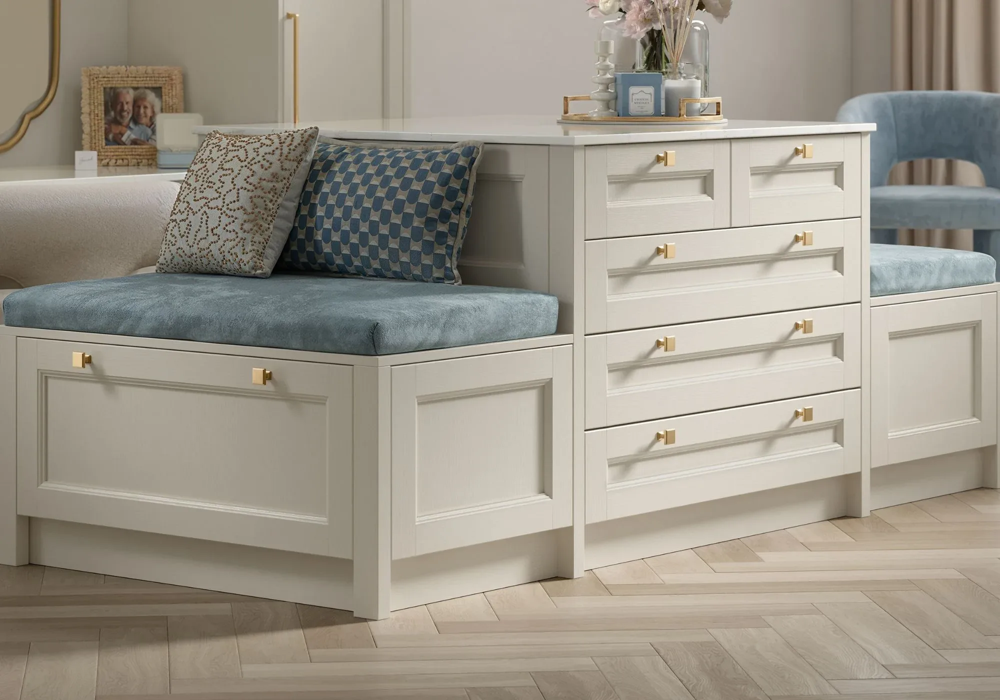 Bespoke window seat with blue cushions beside a made-to-measure drawer chest